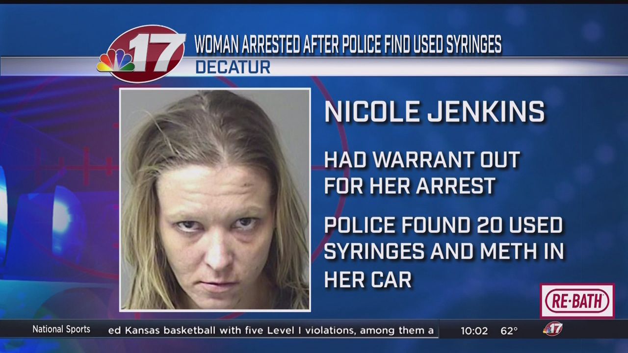 Police: 20 syringes, meth found in woman's purse